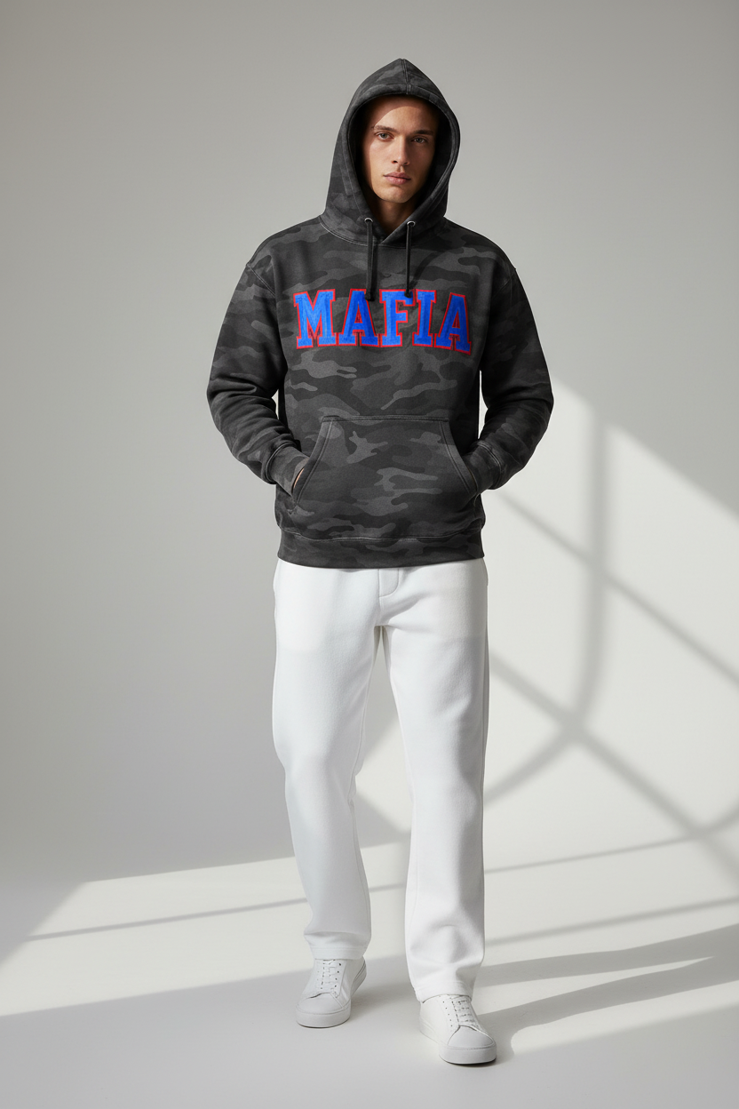 Model wearing black camo MAFIA hoodie with white pants