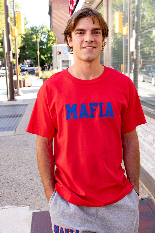 Male model wearing red MAFIA t-shirt with royal sewn-on lettering