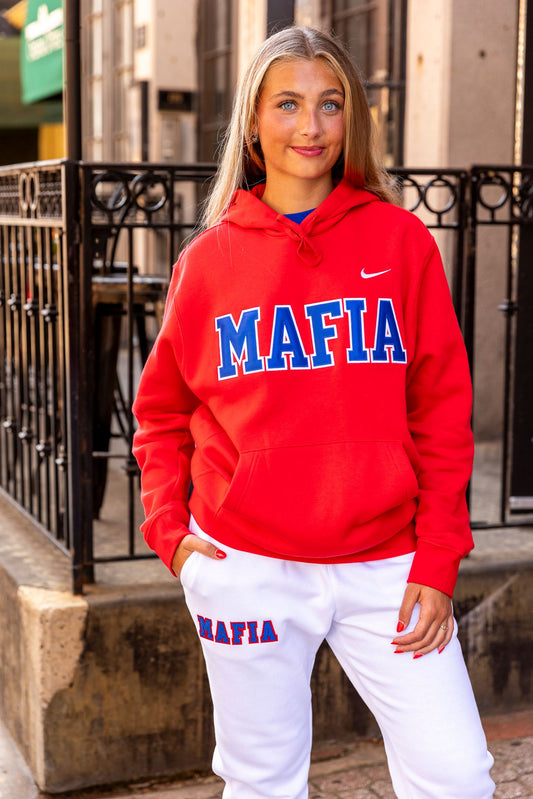 Female model wearing red MAFIA hoodie with sewn-on lettering