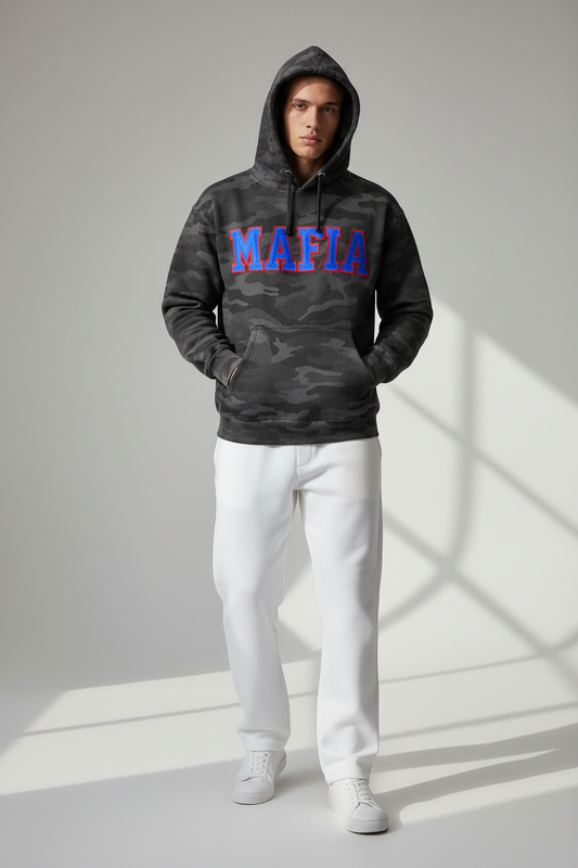 Model wearing black camo MAFIA hoodie with white pants