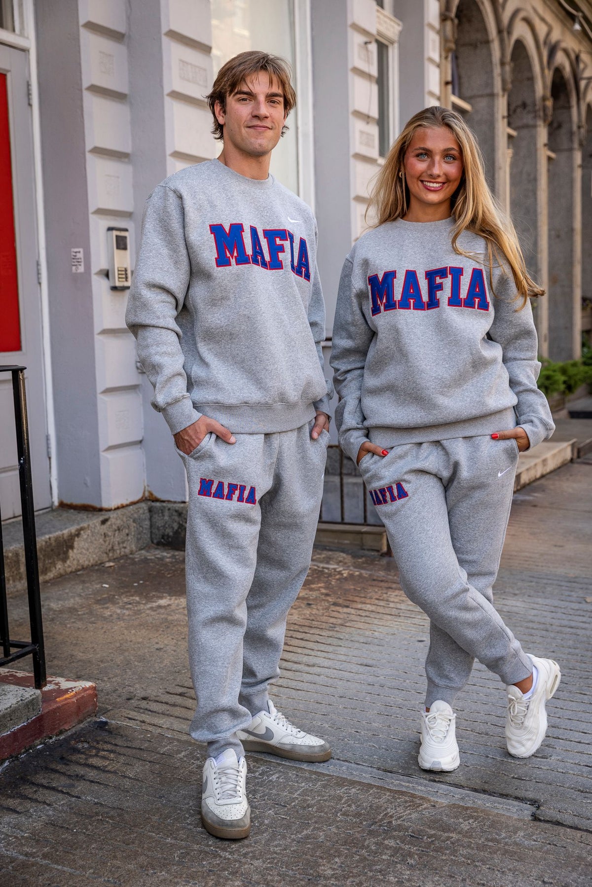 Male and female models wearing grey MAFIA crewnecks